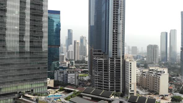 Cinematic citycape aerial view, overhead view of buildings and skyscrapers in a city.