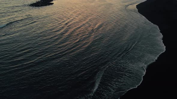 Black Sand Beach Coast at Sunset, View From Drone. Adeje, Tenerife Island, Spain
