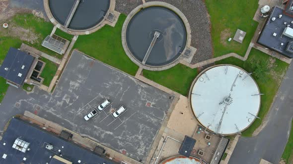 Primary Sedimentation Stage Sewage Flowing Through Large Circular Tanks alt