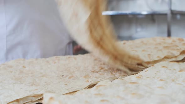 The Process of Cooking Armenian Lavash in a Bakery
