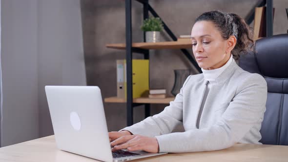 Female in Workscape Using Computer