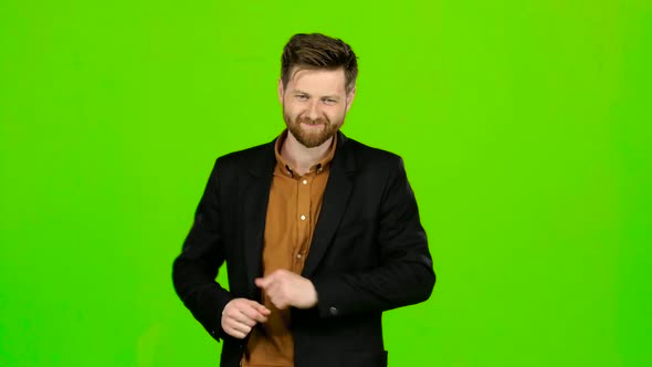 Man Is Dancing Energetically, He Is Having Fun. Green Screen alt