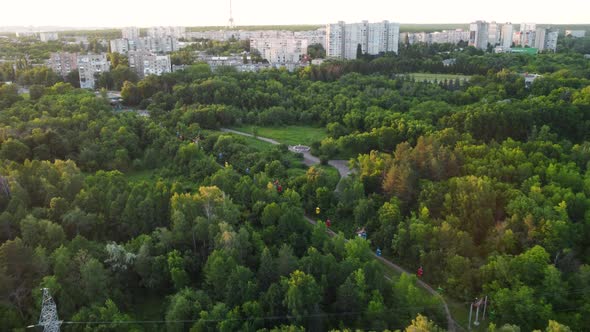 Green sunset park attractions aerial, Kharkiv city