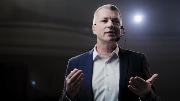 Showman, Middle Age Male Entertainer, Presenter or Actor on Stage, Arms To Sides, Smoke on alt