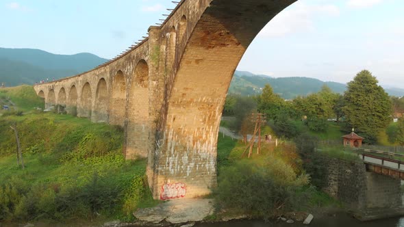 Ancient Railroad Bridge Over the River alt