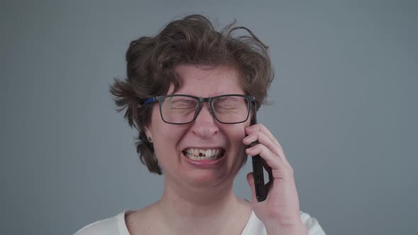 Crying with Despair and Pain Young Woman Victim of Domestic Violence and Abuse with Tooth Injury alt