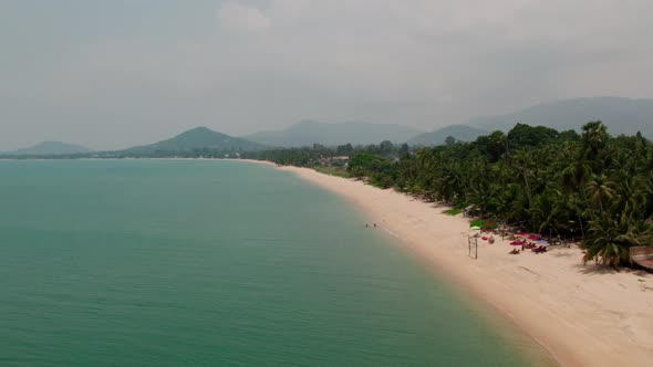 Drone view of Maenam beach, north Koh Samui, Thailand alt
