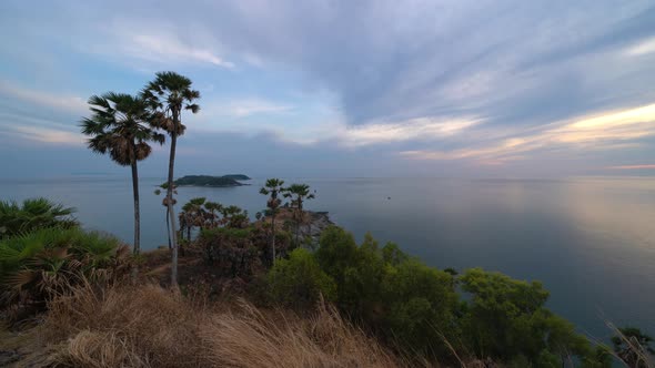 Time lapse of Promthep Cape viewpoint at sunset with Andaman sea in Phuket, Thailand. alt