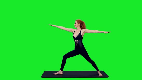 Sporty Slim Woman Doing Yoga Exercises On Green Screen Background