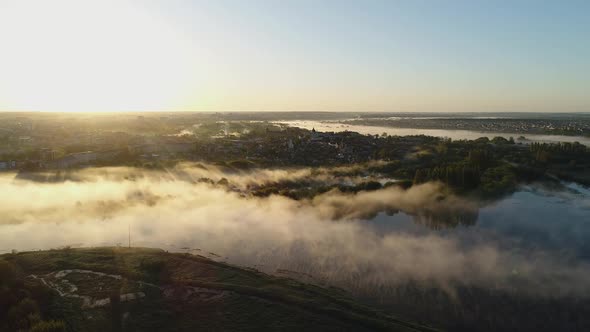 Sunrise and Fog Over the River Styr and the Historic Part of Lutsk Ukraine