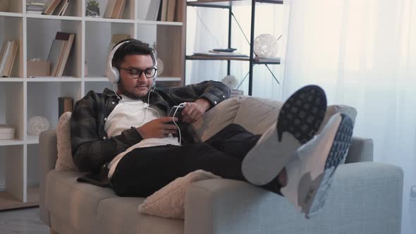 Music Relaxing Song Listening Man Headphones Couch alt
