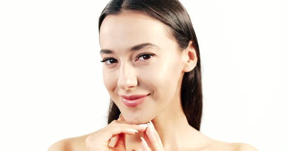 Portrait of Beautiful Woman on White Closeup