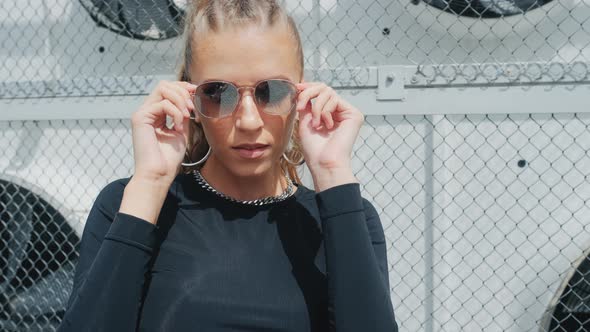 Young Sporty Woman Is Posing Sexy alt