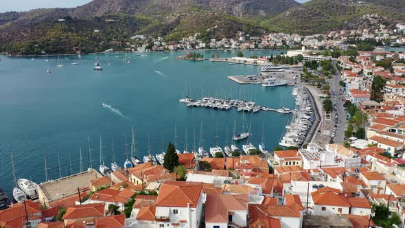 Aerial View of Poros Old Town and Marina or Seaport Greece  Drone Videography alt