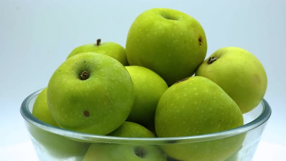 Green apples from the garden on a white background