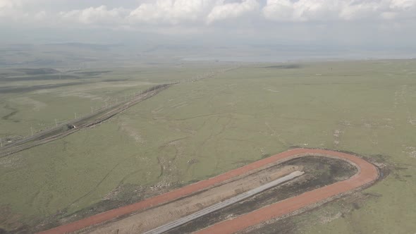 Moving along railroad tracks. Aerial view of Railroad emergency stop track in Trialeti, Georgia alt