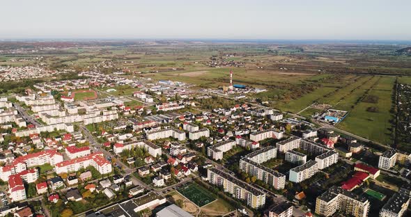 North of Poland, aerial view of little rural village in the countryside with condo residential house alt