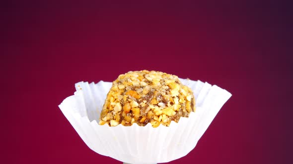 Delicious Handmade Sweet with Yellow Sprinkles in Container alt