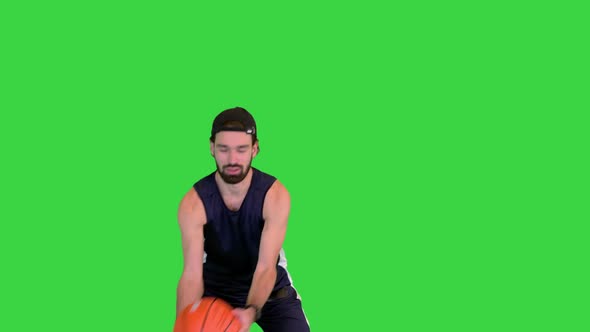 Basketball Player Giving a Pass on a Green Screen Chroma Key