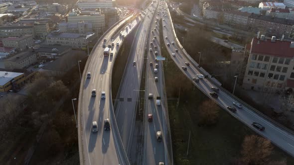 Aerial View of Elevated Highway Traffic at Sunset