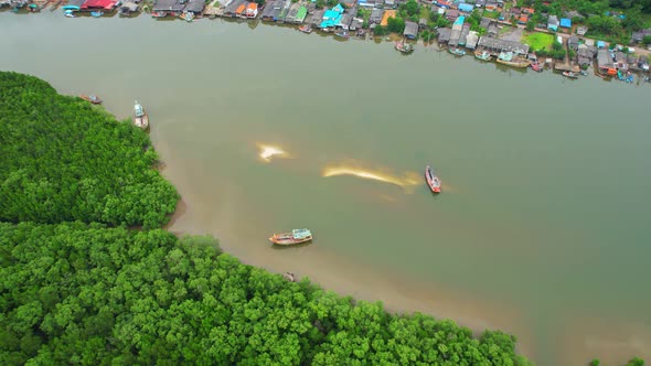 Aerial view over the harbor and fishing villages alt