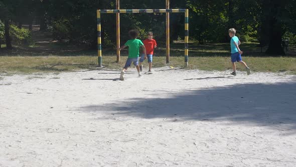 School Boys Kicking Ball at Yard Stadium, Male Sport Hobby, Summer Recreation