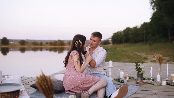 Close-up of Two Young People in Love Looking Into Each Other's Eyes with Happiness. alt