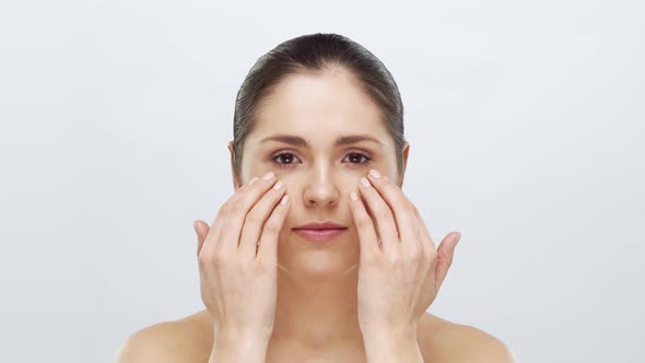 Studio portrait of young, beautiful and natural blond woman alt