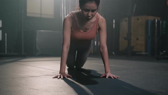 Active Asian Woman Exercise Workout in Gym Healthy Lifestyle bodybuilding doing push up