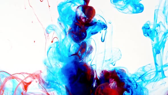 Color Ink in Water on White Background alt