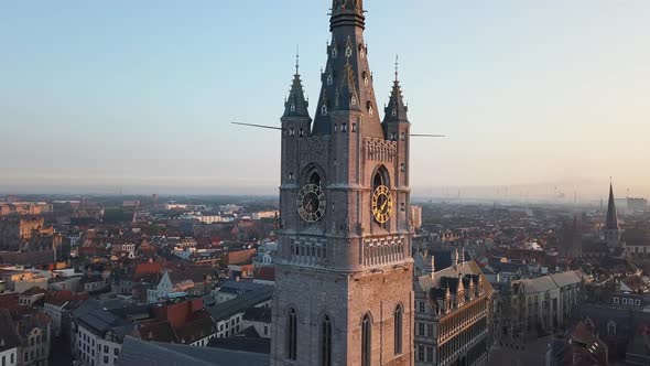 Aerial Parallax Push In shot of Old Bell Tower. Aerial shot Het Belfort Van Gent, Ghent, Belgium alt