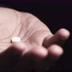 Close Up of Man Hand Holding Pills with Copy Space - VideoHive Item for Sale