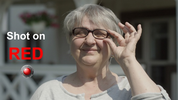 Portrait Of Smiling Old Woman alt