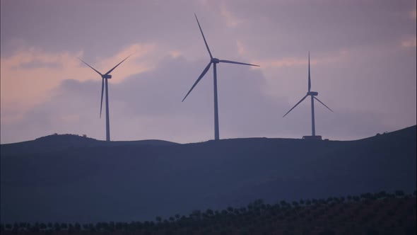 Wind Turbines on Hills at Evening, Timelapse