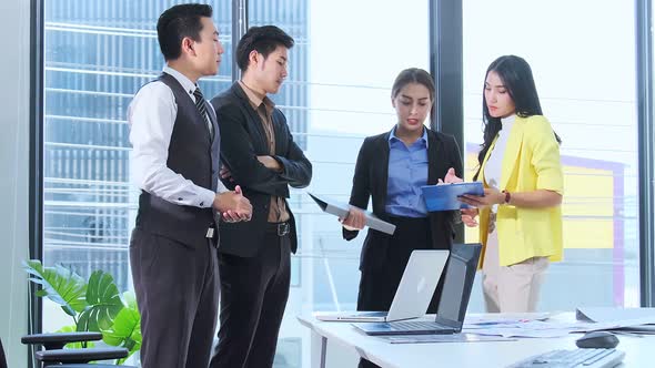 new normal office lifestyle asian businessman and businesswoman casual standing meeting alt