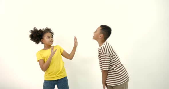 Black Boy Coughing at Girl on White Background alt