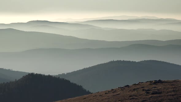 Silhouettes Of Successive Hills And Mountains alt
