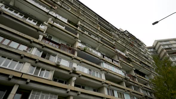 The Facade of a Highrise Residential Building with Unusual Balconies alt