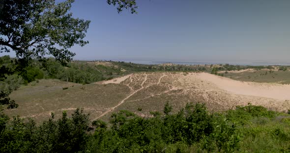Sleeping Bear sand dunes scenic overlook in Michigan with left to right pan in slow motion. alt