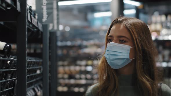 Closeup Young Woman Caucasian Girl Consumer Buyer Wears Medical Mask During Coronavirus Pandemic alt