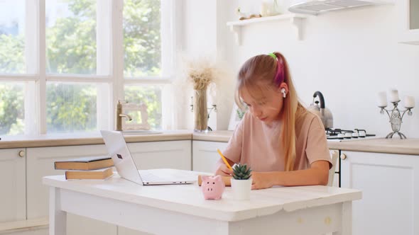 Teenage Girl Studying Online From Home with Distance Teacher