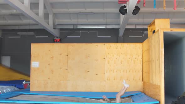 Young Ambitious Sportsman Is Going To Do a Stunt at Trampoline alt