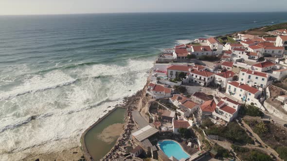 White houses tumbling down to the Atlantic, picturesque town of Azenhas do Mar, Sintra, Portugal alt