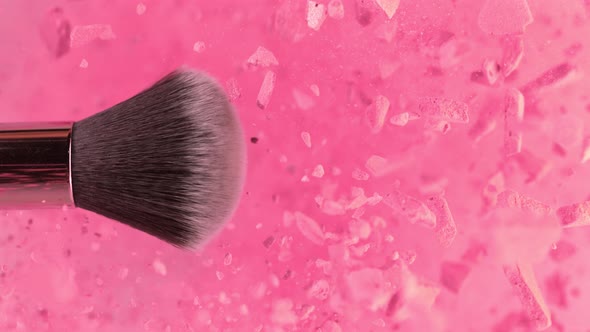 Super Slow Motion Shot of Makeup Brush and Pink Powder Explosion at 1000 Fps alt