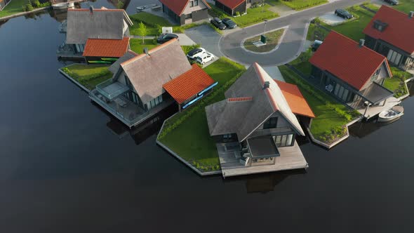 Aerial View Of Holiday Villas On The Water, Waterstaete Ossenzijl, The Netherlands - drone shot alt