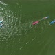 Mixed Race of Kayakers and SUP Boarders Bypass Buoy on Water - VideoHive Item for Sale