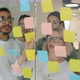 Creative Team of Coworkers Using Sticky Notes for Problem Solving Planning Work in Office - VideoHive Item for Sale