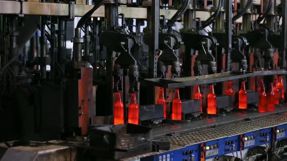 Manufacturing Process of Bottles in Glass Factory.