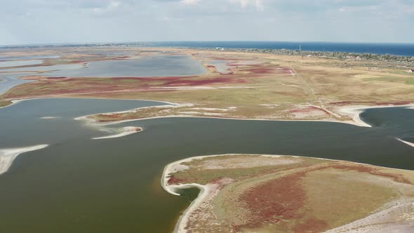 Beautiful flight in summer over salt lakes. Dry lakes. Green grass. alt