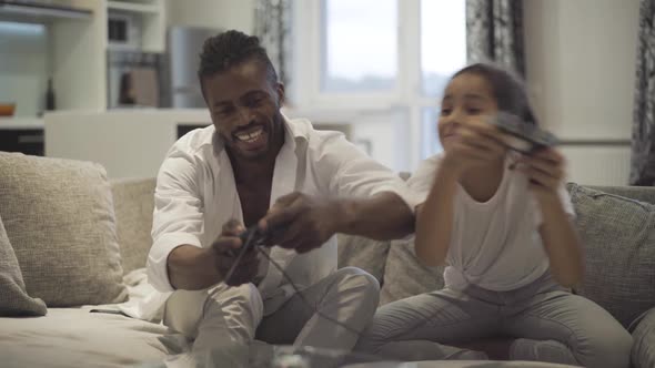 Cheerful Teenage Daughter Positive Father Playing Video Games Home Weekend alt
